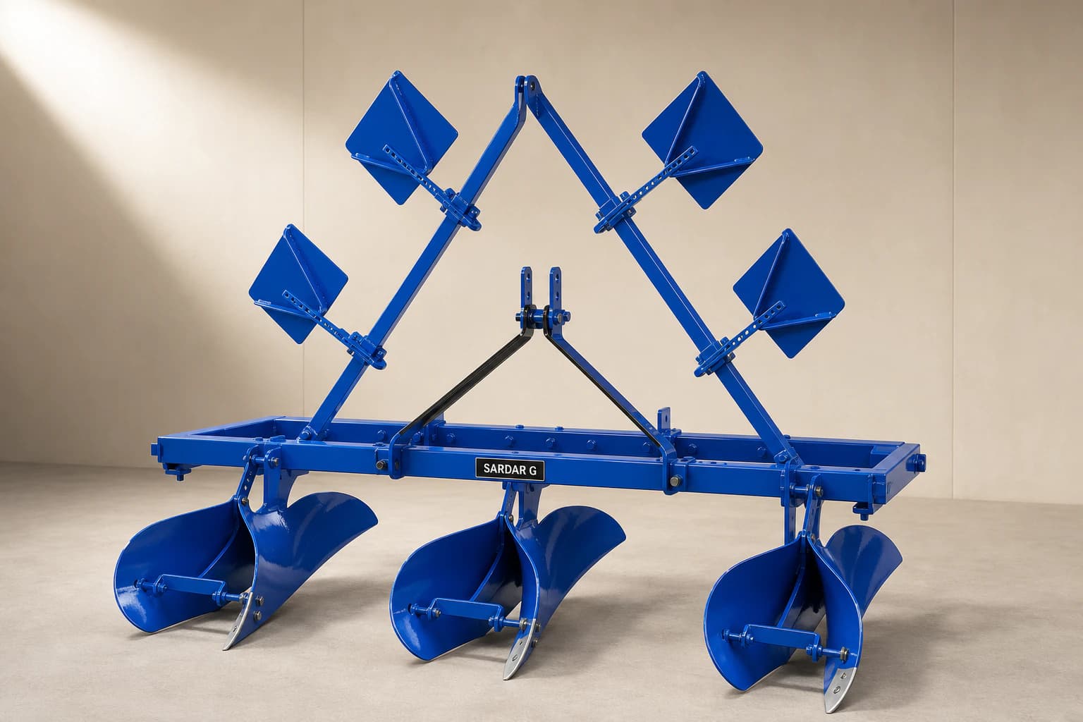 Premium blue three-body Ridger with four square fan vanes in a warm studio